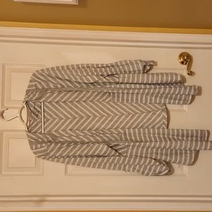 Asymmetrical sweater with hood